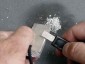 To use the magnesium as tinder to help start your fire, shave off slivers of fine magnesium from the magnesium bar using your Super Scraper or a knife.