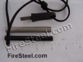 Our FireSteel.com Survival FireSteel with neatly centered lanyard hole, a genuine 550-parachute cord lanyard, along with a Super Scraper and 3-inch Magnesium Tinder Rod