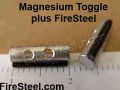 The lightweight magnesium toggle with a small firesteel rod attached.  You can now make tinder and spark up a fire from a button.