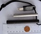 A thick FireSteel with tinder and scraper - everything you need to start a fire