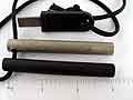 We've drilled a neat, centered hole into the FireSteel through which a genuine length of 550-parachute cord is threaded.  The Super Scraper ensures you get great sparks from your firesteel.  Use the attached magnesium rod as a ready source of tinder